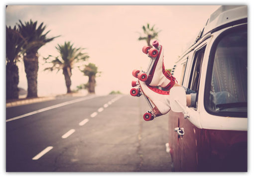 Retro rollerblades and WV camping van.
